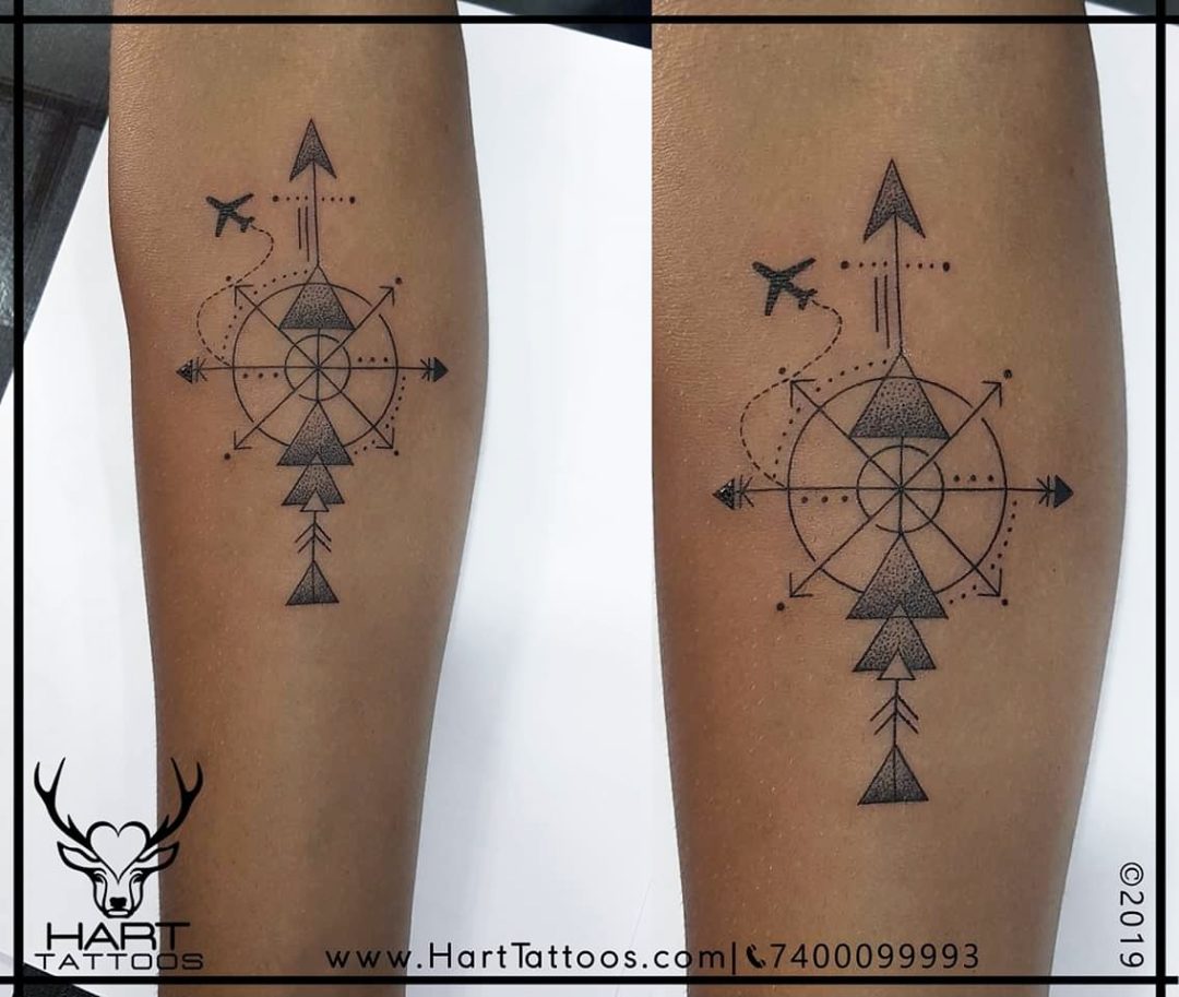 geometric compass tattoo
